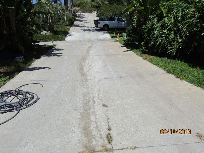 Driveway oil spill during cleanup