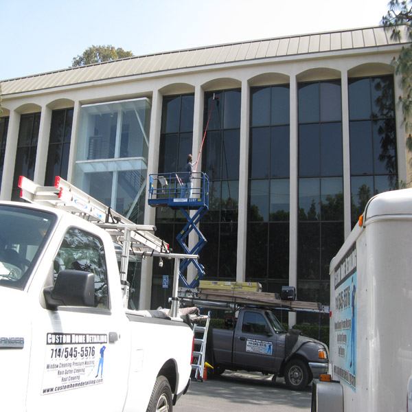 Commercial window cleaning and exterior detailing equipment on site
